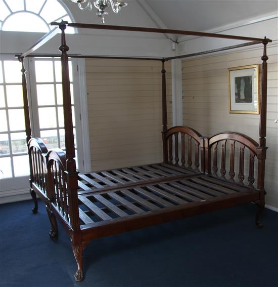 A Georgian style mahogany four poster bed W 5ft.